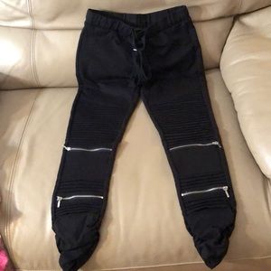 Black joggers with silver zippers